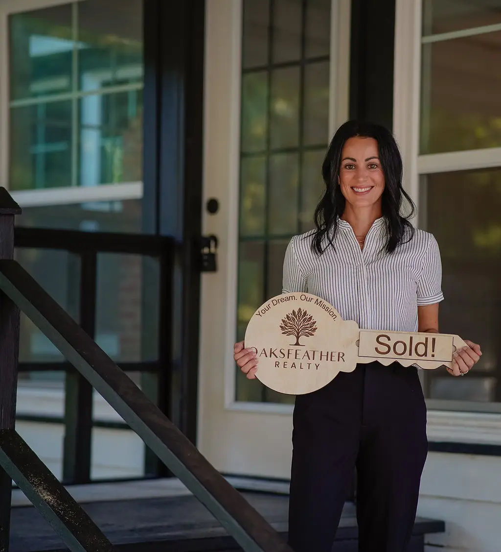 Chelsea Morgan Realtor with sold home.